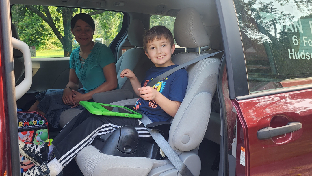 Special education transportation bus in Massachusetts with wheelchair lift, ensuring compliance and safe student transport services